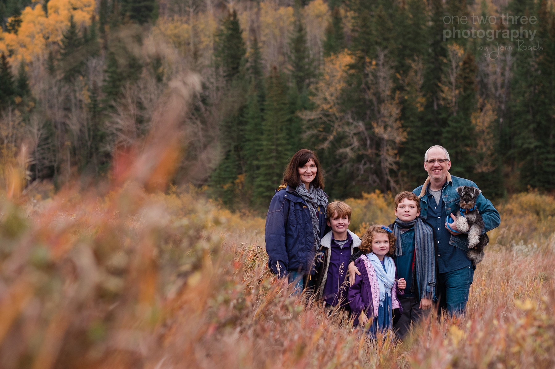 A Cochrane family in the fall during a family photo session