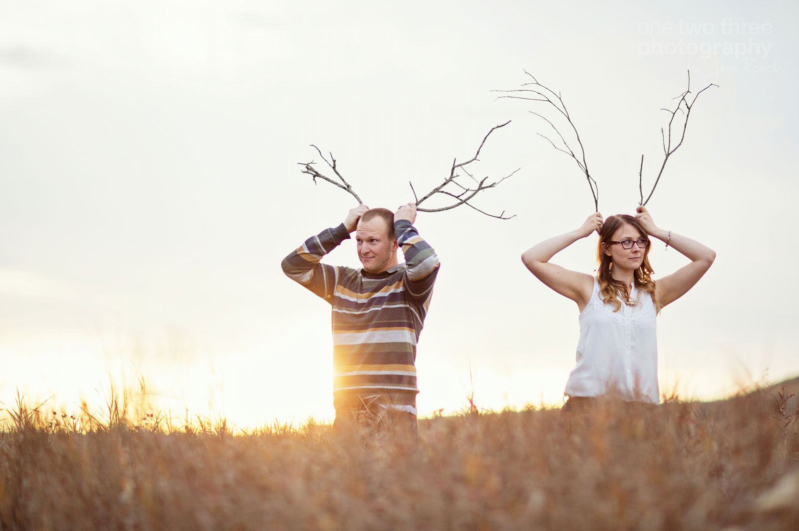 An example of a fun fall photo idea with a hunting couple